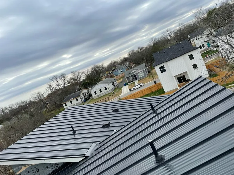 Standing seam metal roof panels with vents for Skylight Repair in Clearfield